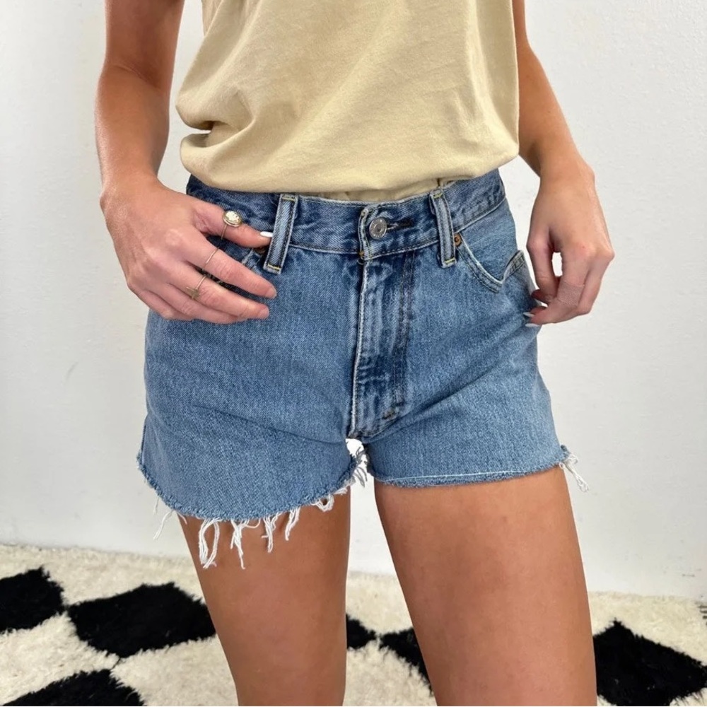 Levi’s 505 Medium Wash Denim Cut Off Shorts with Raw Hem